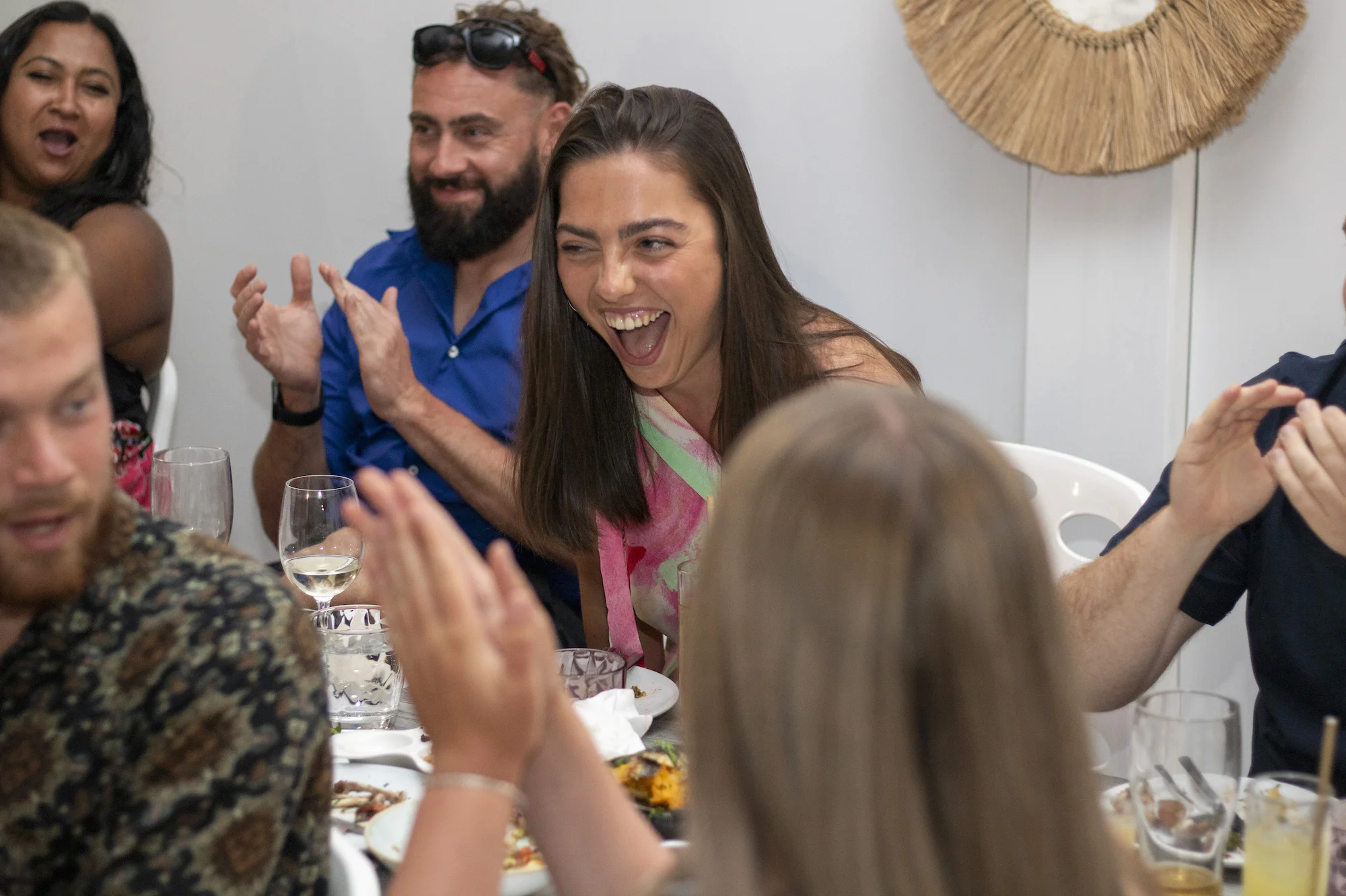 Team celebrating together at dinner